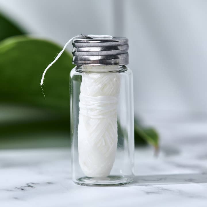 Eco-friendly biodegradable dental floss set with glass jar and two refills